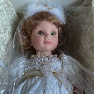 Porcelain Doll with White Lace Dress